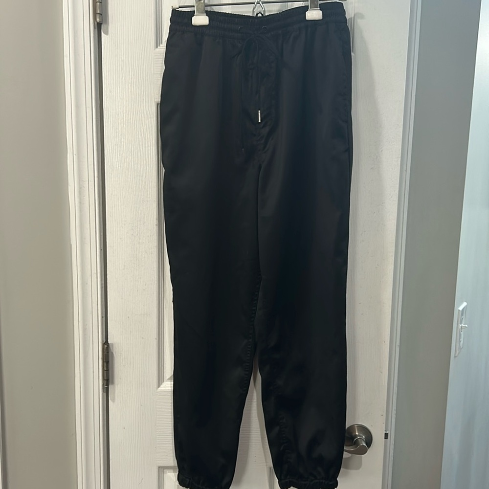 Urban Outfitters satin like black joggers Size Small